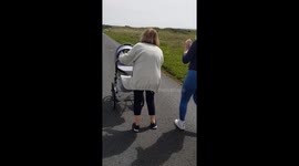 Pretending nanna has a bumble bee in her hair