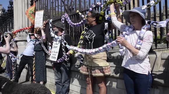 Paperchained  angered at the new police power that can curtial any protest . House of commons London uk