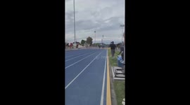 In a running race for runners, the mother left her son, so he entered the track, and he was not paying attention, and one of the runners dropped him to the ground