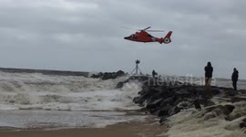 US Coast Guard helicopter rescues man over stormy seas