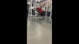 Man's unorthodox use of a cable machine at the gym