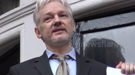 Julian Assange addresses crowds at Ecuadorian Embassy, London