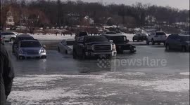 Cars parked on ice near Chicago start to sink as it melts
