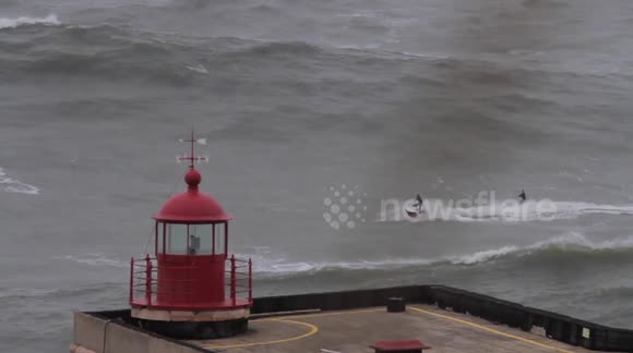 Australian surfer Mick Corbertt rides huge storm waves in Nazare, Portugal