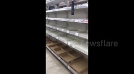 Supermarket shelves bare as Okinawa residents brace for Typhoon Mawar