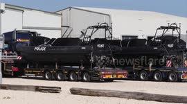 Large police seagoing fast patrol ribs have arrived at Portland in advance of the immigrant's barge coming to the port very soon.