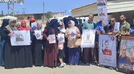 Palestinians protest against the continued detention of the prisoner, Walid Daqqa who has cancer in Israeli prisons