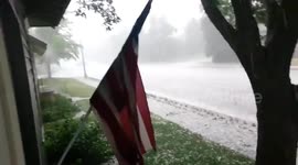 INCREDIBLE video footage has captured the moment the heavens opened to rain enormous hail stones down on to the unsuspecting residents of a small American town.