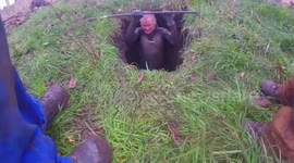 THIS INCREDIBLE video shows cave explorers chipping away at a tiny crack until it is just large enough for one of their number – a Briton - to squeeze through unlocking a claustrophobic cave system within.