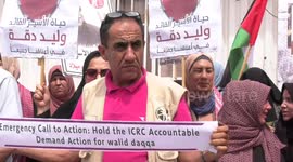 Palestinians take part in a protest to the support with the sick prisoner, Walid Daqqa, helds Israeli Jails, in front of the UNSCO building in Gaza city