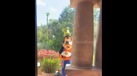 Unsuspecting passersby's goofy encounter with Goofy at Disneyland's Tower of Terror