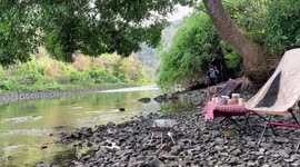 A serene escape turned into a close call: a local gardener saves belongings from rising waters