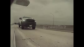 Large Truck Runs Car Off Freeway