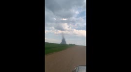 Landspout Tornado Forms and Dissipates in Stettler Canada