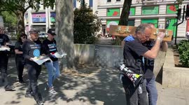Activists stand with dead animals in Marble Arch on National Animal Rights Day