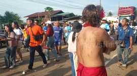 Rocket festival parade at Sakon Nakhon  Thailand was so good even the police joined in.