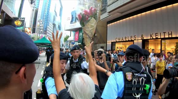 Hong Kong overwhelmed by heavy police presence on day of Tiananmen massacre remembrance