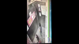 Cutest moment brave little boy stuck in lift uses bicycle to reach alarm button