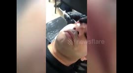 THIS MAN spent over ONE-THOUSAND-POUNDS to look like a VAMPIRE by tattooing his eyes and tongue BLACK and even having FANGS implanted.