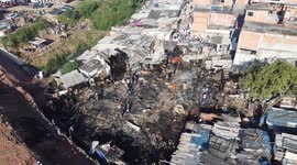 Aerial footage of firefighters putting out fire in Sao Paulo, Brazil