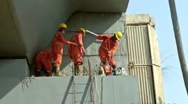 Twelve-year-old boy trapped between pillar and slab of bridge in northern India, rescue operation underway