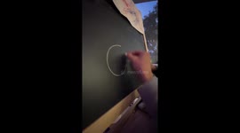 Clever chalkboard challenge: a father-son pictorial game of wits!