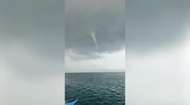 Fishermen flee as waterspout tornado threatens boats in the Philippines