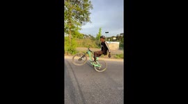 At 15, I broke the world record for wheeling without hands on a bicycle (56 seconds)