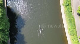 Rowers on the River Ouse in York, enjoying the hot day on the water