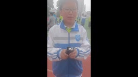 Creative Chinese Seventh Grader Demonstrates Bookbinding Gun on Playground