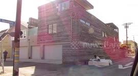 A homeless man sleeps on a KING SIZED mattress outside Anna Paquin and Stephen Moyers $8M home in Venice Beach