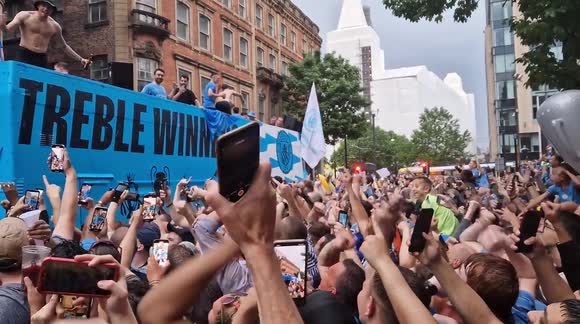 Haaland lets his hair down: a fans-eye view of Man City's bus parade