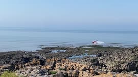 UK pilot's lucky escape after plane crashes into sea, narrowly avoiding rocky shore