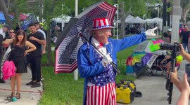 Newsflare Edit - Uncle Sam singing at The Protest for Trump in Miami, FL, USA