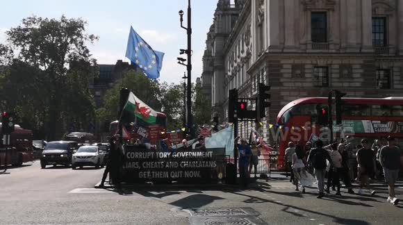 Protesters sing 'bye, bye Boris' as former PM resigns from Conservative party