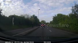 Boy on Bike Nearly Gets Hit by Car After Falling Into Road