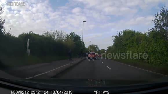 Boy on Bike Nearly Gets Hit by Car After Falling Into Road - Buy, Sell ...