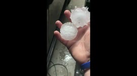 Severe storm unleashes large, spiky baseball-sized hail in Burleson, Texas
