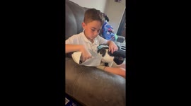 Pure joy sweeps across boy's face after being surprised with his favorite women's basketball player's jersey