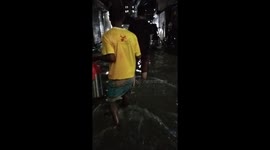 It has rained heavily today. The streets of the city are flooded.  It is difficult for common people to travel.