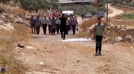 Palestinians argue with Israeli security forces during a protest against the establishment of Israeli outposts, in Beit Dajan, east of the West Bank city of Nablus