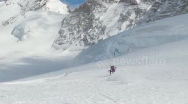 Drone Footage of Skier Falling Into Glacier Crevasse