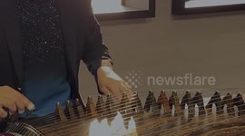 HK entrepreneur promotes Chinese culture through traditional musical instrument