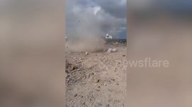 Tip worker captures amazing footage of dust devil spinning through a recycling centre
