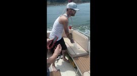 Memorial ashes being spread by my friend and his brother