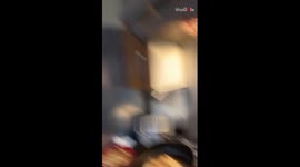 Fire fighters arrive when a man falsely triggers fire alarm by cooking pratha chai