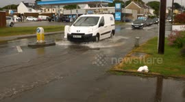 Thunderstorms and flash floods hit Cornwall as vehicles plow through flood water in Newquay