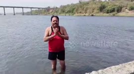 Cop Performs Water Yoga for One Hour on International Yoga Day in Damoh, India