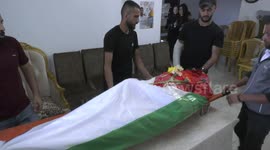 Palestinians take part in the funeral of Mahdi Bayadsa, 29, whose body was detained by the Israeli army after he was killed on earlier this month