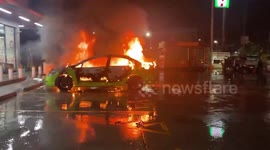 Taxi erupts in flames outside 7-11 shop in Thailand